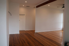 timber floor room white walls